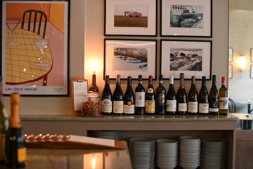 Enjoy the cozy atmosphere, great drinks, and tasty food at Litli Barinn