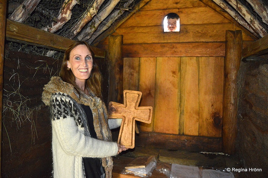 Regína inside The beautiful Geirsstaðakirkja Turf Church in East-Iceland - a Replica of an old Turf Church​