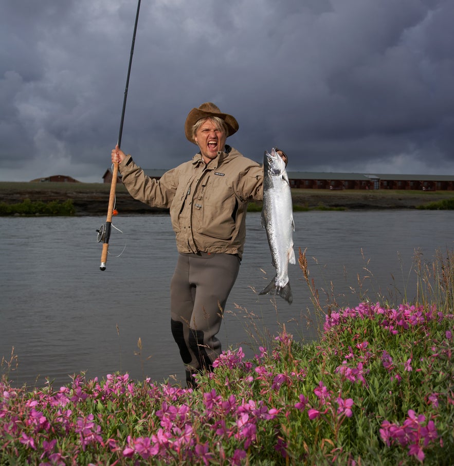 man fishing iceland