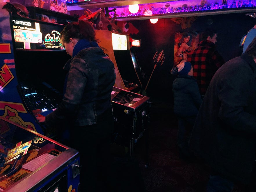 People playing at Freddi Arcade in downtown Reykjavík.