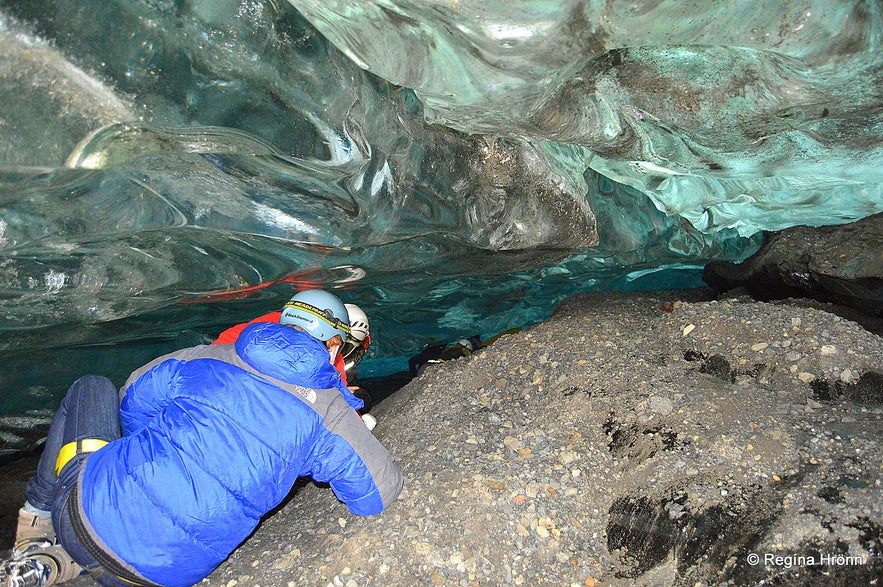 Crawling into the ice cave in Fláajökull glacier