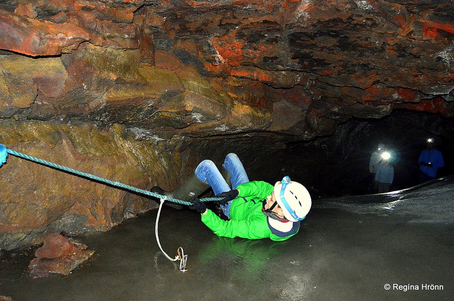 Sliding on a rope in Lofthellir cave