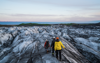 People hiking on Vatnajökull Glacier, South Iceland.