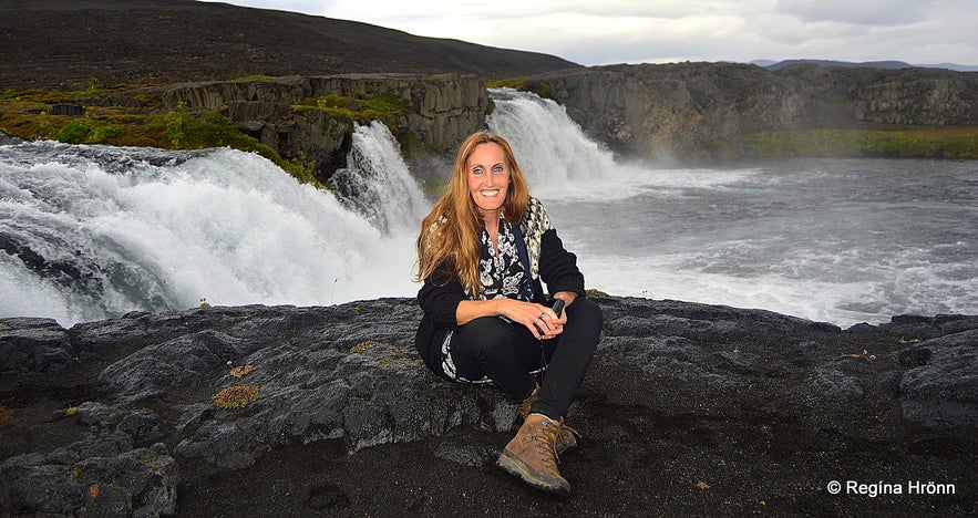 Regína by Skínandi waterfall in Svartá river