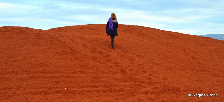 Regína on the red sand of Seyðishólar craters South-Iceland