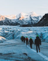 Hiking across glacial fields on Europe's largest glacier, with breathtaking mountain scenery.