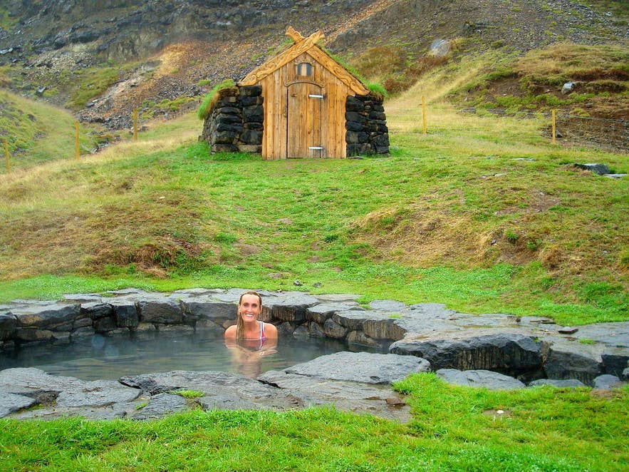 Gudrunarlaug geothermal pool in West Iceland, a natural hot spring for bathing.