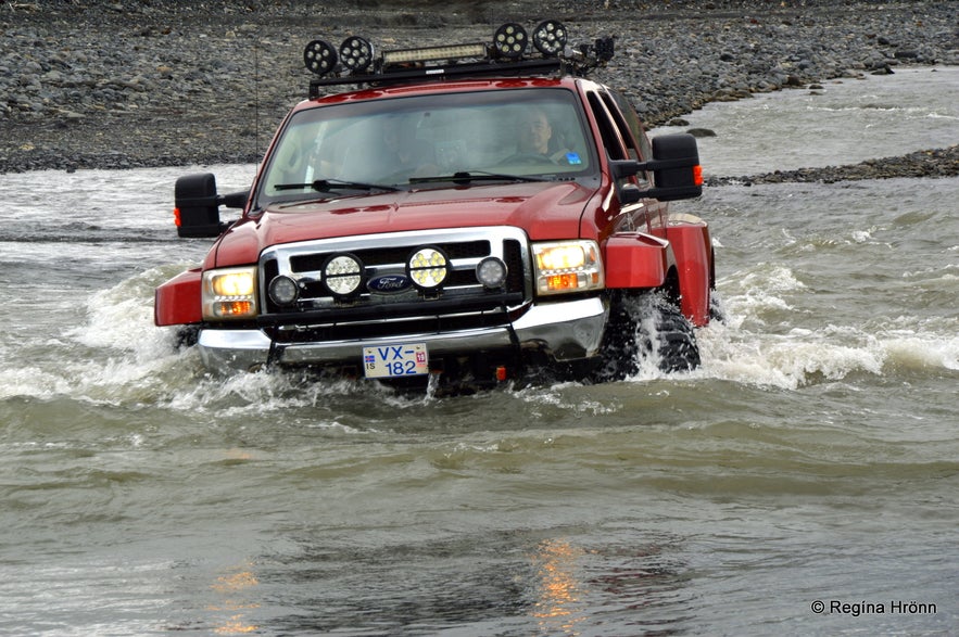 Crossing the glacial river Krossá in Þórsmörk