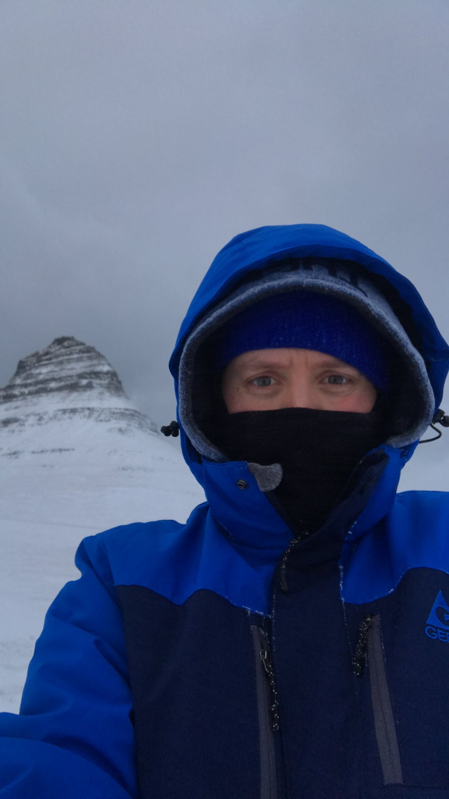 I am wearing 4 layers on my head alone. Kirkjufell in the background