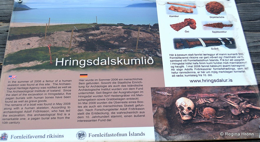 An information board detailing the Hringdalskumlið pagan graves