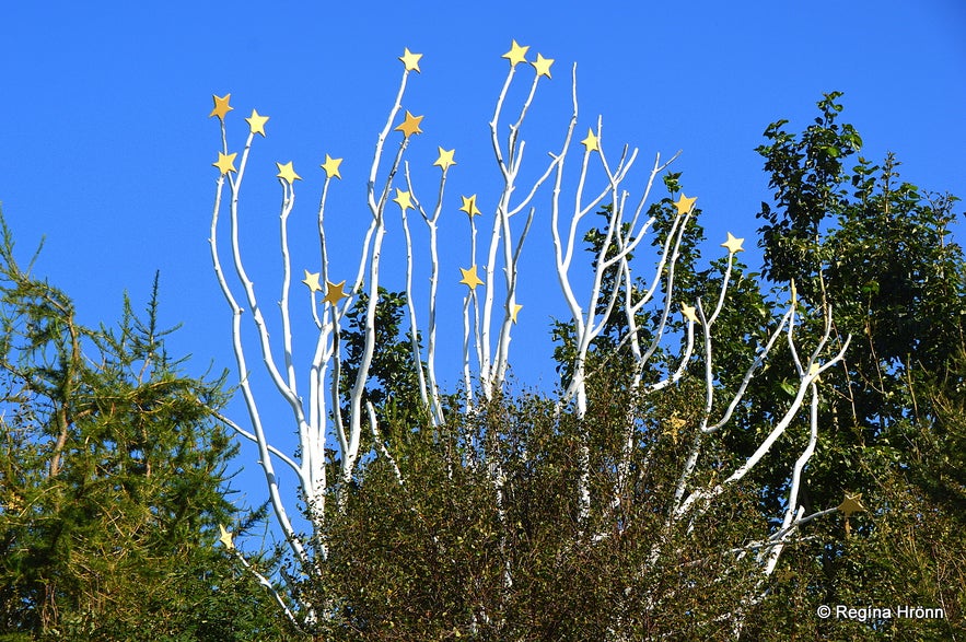 White tree with stars on top of its branches representing unborn children