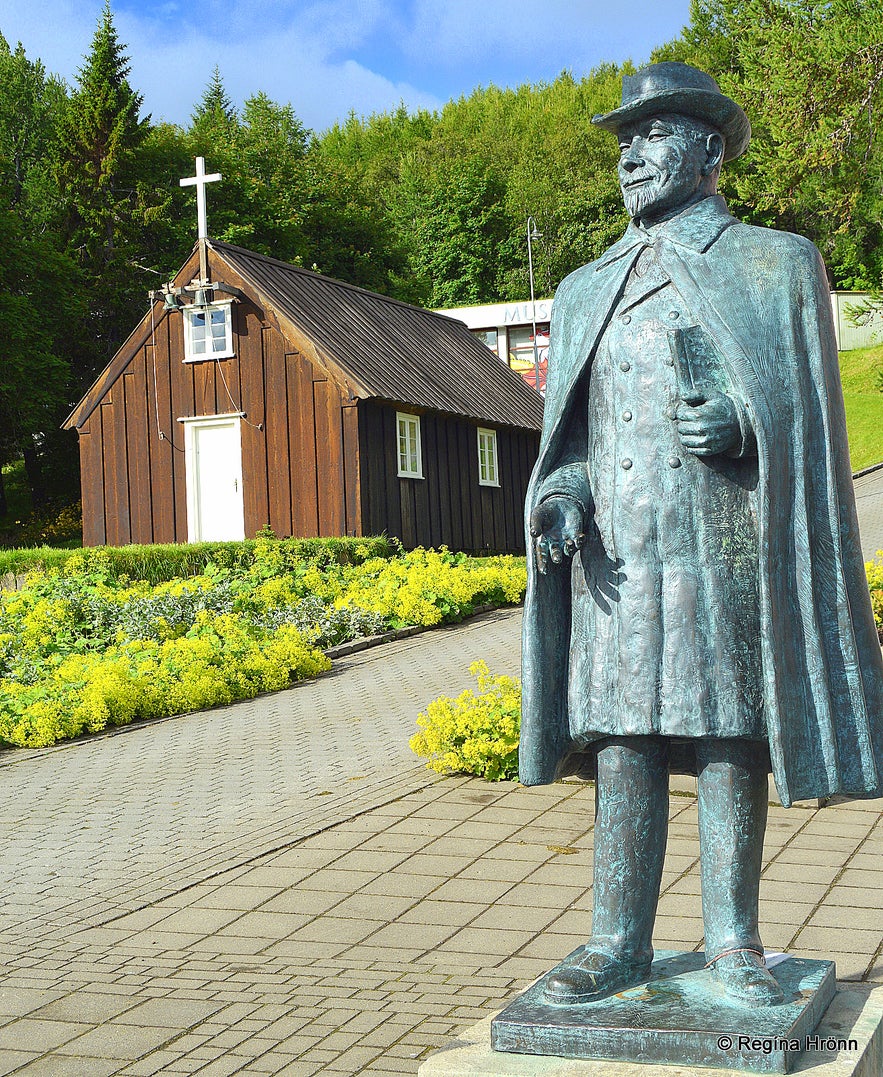 The Nonni statue by Nonnahús - and Minjakirkjan in Akureyri