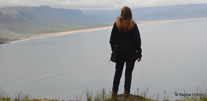 Regína admiring the view from Keflavíkurbjarg cliffs