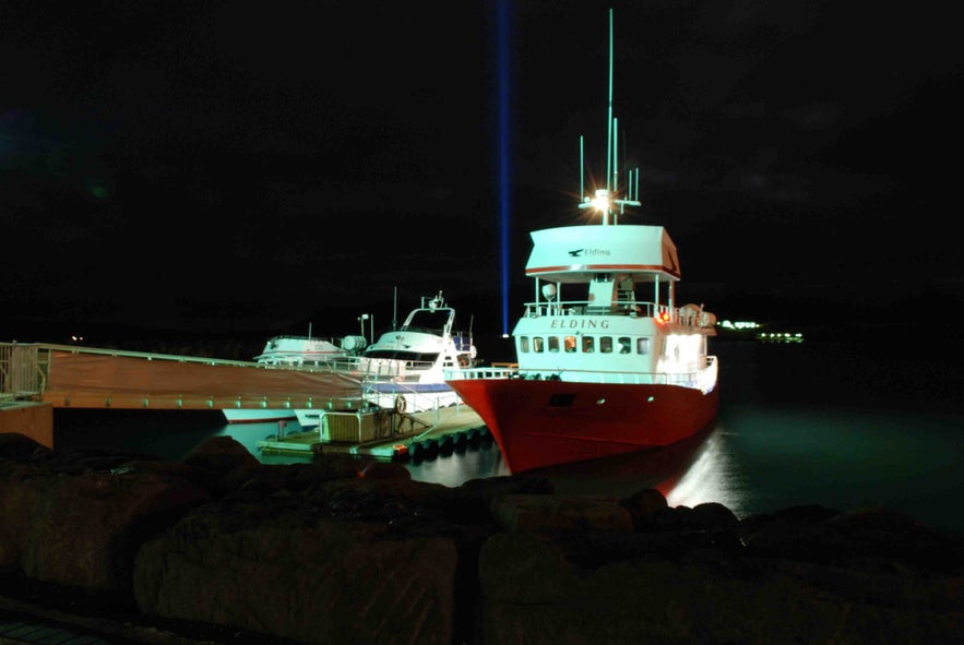 Boats ferry guests from Reykjavik to see the Imagine Peace Tower throughout the year.