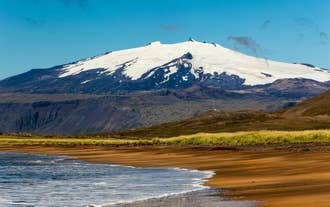 Snæfellsjökull glacier towering over the peninsula, standing as a stalwart defender of west Iceland.