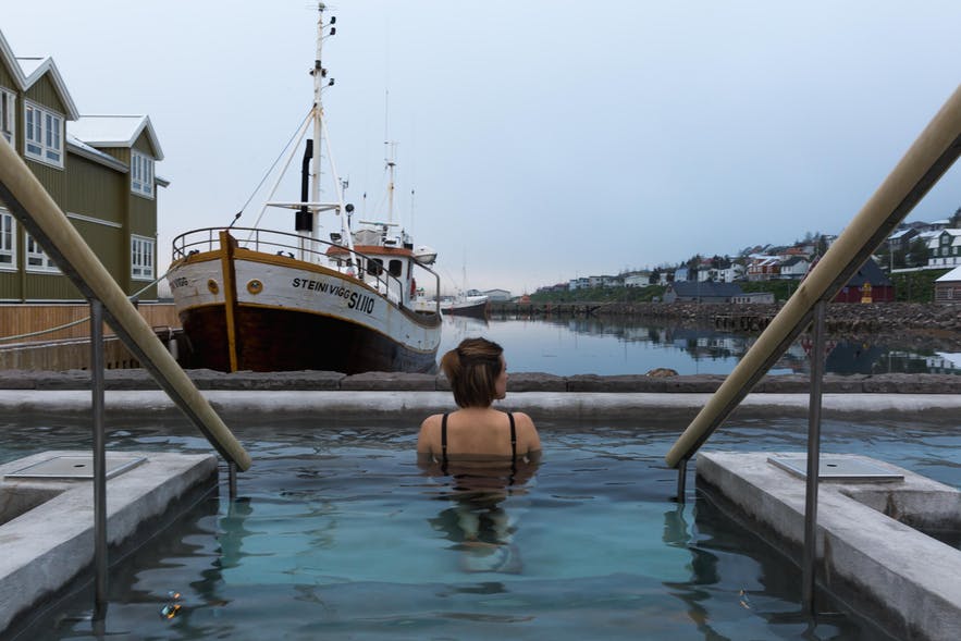 Taking a dip in a hot tub in Siglufjörður town.