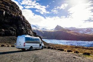 A comfortable minibus parked up during a tour of Iceland's South Coast.