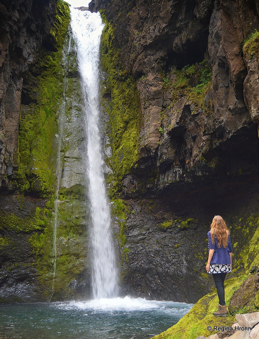 Regína by Kotárfoss waterfall in Kotagil Gorge in North-Iceland