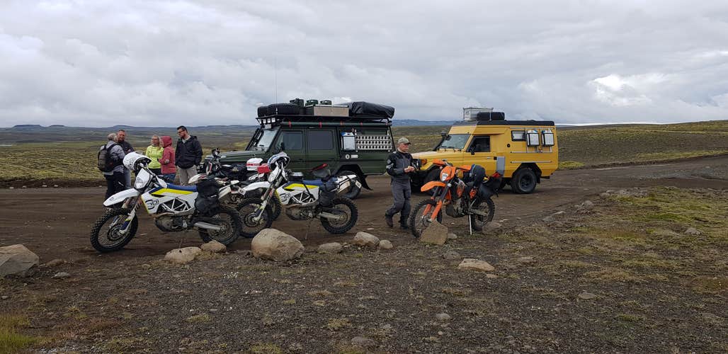 Modified jeeps and dirt bikes ready to take on the day.