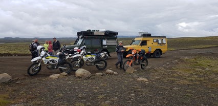 Modified jeeps and dirt bikes ready to take on the day.