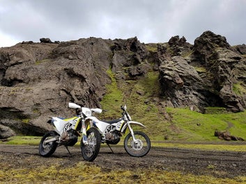 Bikes standing at ready in the lava torn highlands