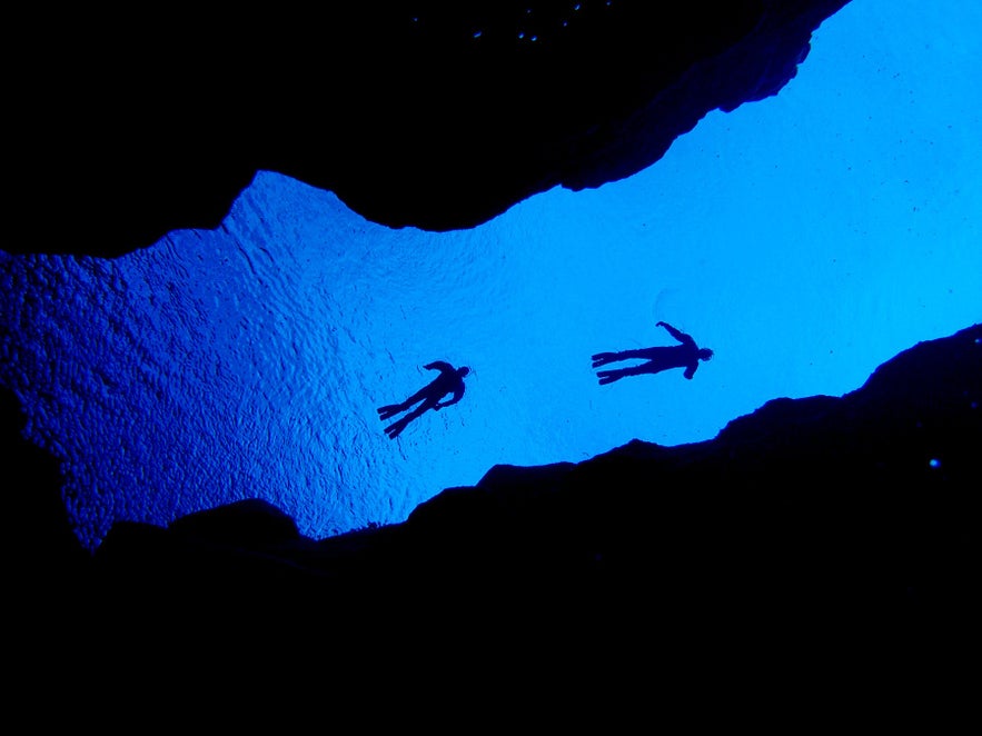 Snorkel between two continents in Silfra fissure.