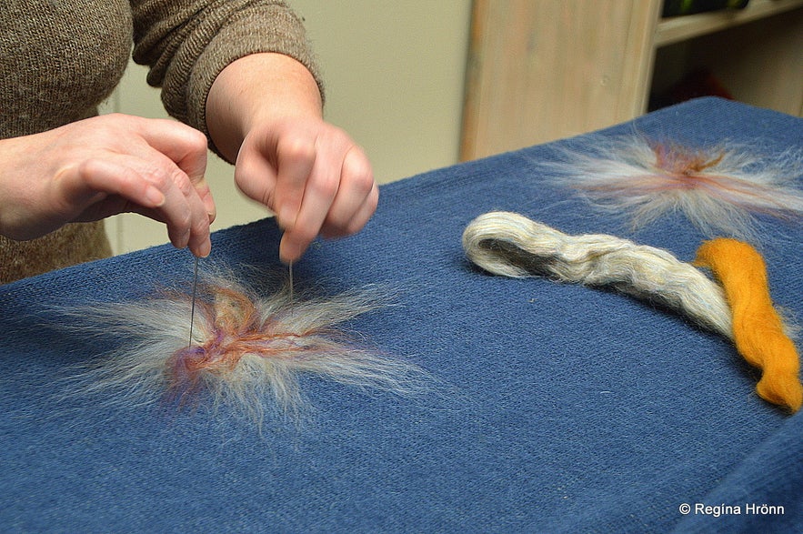 Birna creating patterns at her textile studio at Daladýrð