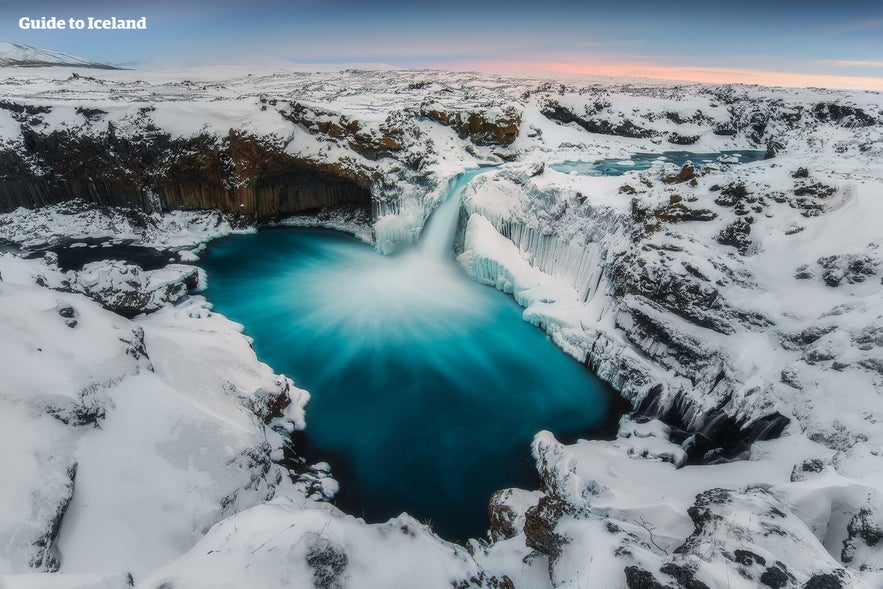 Aldeyarfoss is surrounded by basalt columns, and can be found in north Iceland. Pictured here in winter.