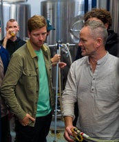 Guests are encouraged to ask questions about the beer-making process.