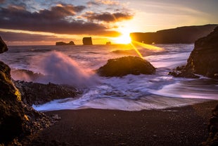 Admire the crashing waves of the Atlantic Ocean on Reynisfjara black sand beach