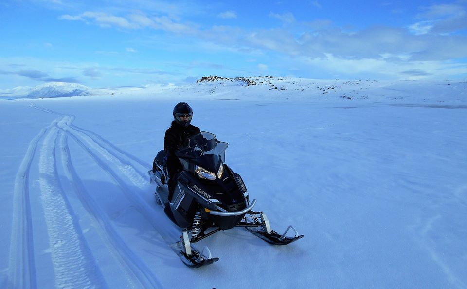 North Iceland's snowy mountains and landscapes are perfect for thrilling snowmobiling tours.