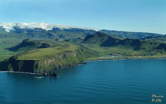 A glacier rises over the South Coast of Iceland.