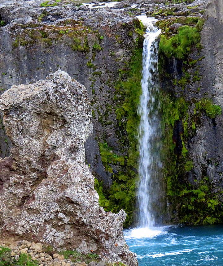 By Goðafoss waterfall