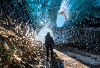 Iceland has glacier caves in its sout-east, that open in winter.