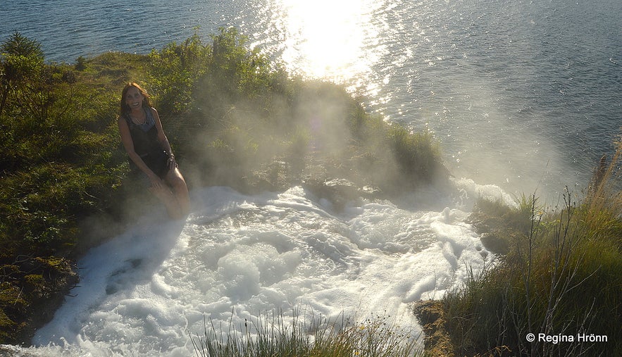 Regína footbathing in the hot water river which originated in the making of the tunnel