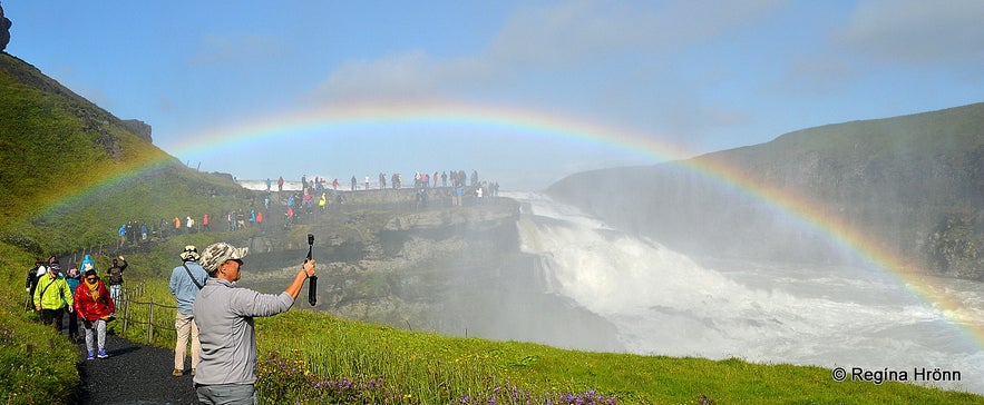 People visiting Gullfoss waterfall