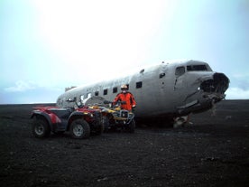 The plane wreck on the black sand beach of Solheimasandur creates a surreal image.