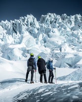 A group of people gearing up for a glacier hike in Iceland