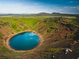 A crater lake with blue water