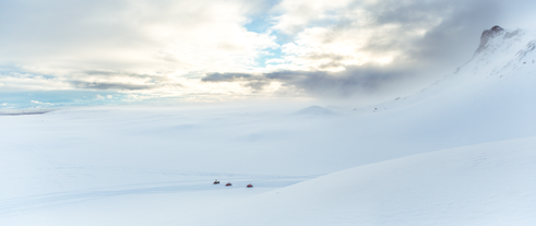 Thrilling 2.5-Hour Into the Glacier Snowmobile and Ice Cave Tour