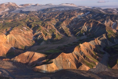 The Icelandic Highlands is defined by colorful mountains and rugged landscapes.