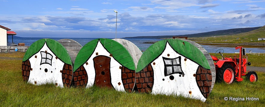 Wonderfully Colourful Fairytale Figures in Akureyri in North-Iceland Regína Hrönn Ragnarsdóttir By  Regína Hrönn Ragnarsdóttir Verified Local Contact Regína Hrönn Ragnarsdóttir Colourful Fairytale Figures in Akureyri in North-Iceland  Hidden away in a private backyard in Akureyri town, the capital city of North-Iceland, I found extraordinary colourful sculptures of fairytale figures. I got permission from the folk artist Hreinn Halldórsson to show them to you here in my travel-blog.  I didn't know about this wonderful fairytale garden, but while we were staying at Mývatn for a couple of days my husband had listened to the news, where the garden was featured. So while returning home the next day he wanted to surprise me and drove into a residential area in Akureyri and told me to look into all the gardens...  Colourful Fairytale Figures in Akureyri in North-Iceland  Pippi Longstocking  I didn't know what I was looking for but was in awe when I spotted all the colourful statues in the garden, where the folk artist Hreinn has created a private gallery haven in his backyard at Oddeyrargata 17 street.  We had shown up unannounced, but Hreinn was in his garden working and invited us in and showed us around, and took the time to tell us about each and every statue. Colourful Fairytale Figures in Akureyri in North-Iceland  The artist Hreinn with Gulli gosi  Here you will find statues from several fairy tales, f.ex. the Grimms' fairy tales and I saw Snow White and the 7 dwarves, Sleeping Beauty, Little Red Ridinghood and several others. The Swedish Astrid Lindgren's Pippi Longstocking sat up in a tree with her monkey. And the mischievous Emil by the same author sat on the roof.  Then we saw figures from Icelandic fairytales, and the Icelandic Dimmalimm by Muggur sat by the pond. And Sigríður and Indriði from the Icelandic book Piltur og stúlka. Colourful Fairytale Figures in Akureyri in North-Iceland  Sleeping Beauty and the prince are a new addition to the gallery  Hreinn "lets the statues out of his basement", as it were, in the Spring and bolts them down so they don't budge, and it can be quite a task to move them. But Hreinn, who has lived in Akureyri for 13 years now, has had these delightful statues on display both at the annual Hrafnagilshátíð festival and at Amtsbókasafnið - the Municipal Library close to his home, and more places.  Hreinn works at the reception of Hotel Kea in Akureyri, but creates his statues in his spare time, always adding more and more wooden statues to his private collection. Colourful Fairytale Figures in Akureyri in North-Iceland  Little Red Riding Hood and the wolf  There are more than 30 colourful statues now in his backyard counting the 5 new additions this year. They are the colourful Pippi and her monkey, Emil, the elf-lady Álfrún and Sleeping Beauty and the prince, and they for sure are a wonderful addition to the gallery.  Kids love visiting this colourful garden and Hreinn has invited around 250 kids from kindergartens for a visit. And more are asking to come for a visit. And as this is not an official gallery he allows them to touch the statues and sit on them. Once he was a bit uneasy though when 3 boys sat on the back of the big bad wolf in the Grimms' fairytale Little Red Riding Hood ;)  Colourful Fairytale Figures in Akureyri in North-Iceland  Álfrún the elf-lady and the wishing stone  Hreinn told me that he welcomes visitors, who want to have a look at his work. Be on the lookout for the elf-lady Álfrún with her old doll carriage. In the carriage, you will find a  wishing stone. You can touch the wishing stone with your closed eyes and make a wish. Álfrún the elf-lady is a new addition to the collection.  I was so lucky that the sun was shining making the colours of these lovely statues even more vivid. If you look closely at the statues you will see all kinds of recycled material; candlesticks, kitchen utensils, rope, etc. Visitors have also come bearing gifts for Hreinn to use for his statues.  Colourful Fairytale Figures in Akureyri in North-Iceland  Dimmalimm and Þórunn hyrna  Hreinn uses old Christmas ornaments, buttons, old toys and gets left-over wood from workshops to build his wonderful statues. And he is a regular customer at the handicraft shop in Akureyri.  In my first photo, you will see a Viking in the background. This is Helgi magri, the Settler of Eyjafjörður fjord, about whom you can read about in my travel-blog about Akureyri.  On the other side of the shed in my photo above, you will see his wife Þórunn hyrna, the settler-woman. They used to stand side by side but had an argument, so she walked away and was found by the house. She is now by the shed and Hreinn is hoping that they will reconcile soon ;)  Regína and Colourful Fairytale Figures in Akureyri in North-Iceland  With Snow White and the 7 dwarfs  By the beautiful corrugated iron clad house you will find Snow White, the wicked stepmother, the prince and the 7 dwarfs, each with a special name, which Hreinn has given to them, all wonderfully colourful and cheerful.  I asked Hreinn if he sold any of his fairytale figures and he said no; he puts his heart and soul into his work and wants to keep them. I can relate to what he was saying.   Colourful Fairytale Figures in Akureyri in North-Iceland  I have also put my heart and soul into the 280 travel-blogs about Iceland, which I have written over the past 7 years and regard them as a part of myself. And I hope that my passion for Iceland shines through :)  Hreinn told us the name of this statue below, but I cannot recall it; this boy holds a lantern to show Hreinn the way to his house when he returns back home.   Colourful Fairytale Figures in Akureyri in North-Iceland  What a lovely visit this was, thank you Hreinn, for creating such a wonderful garden, it sure brightens up the world :) You can visit Hreinn's page on Facebook for more photos.  And if you want to see the work of Hreinn's role model, the folk-artist Samúel Jónsson, then I have written about Arnarfjörður and the folk-artist in another travel-blog.  Akureyri town North-Iceland  Akureyri town  I have written another travel-blog about Akureyri if you want to find out more about the lovely capital of the north: Eyjafjörður Fjord - Akureyri, the Capital City of North-Iceland. There are so many things to see and do in this lovely town.  Akureyri is located up north, some 388 km from Reykjavík the capital city of Iceland. To reach this area you can rent a car in Reykjavík and drive to Akureyri in one day.   Eyjafjörður, where Akureyri is located, is Iceland's longest fjord, with many attractions, so I have written some 7 travel-blogs on what there is to see and do here. Here is the first part with links to the other travel-blogs if you want to know more about this beautiful fjord.  Have a lovely time in Akureyri :)