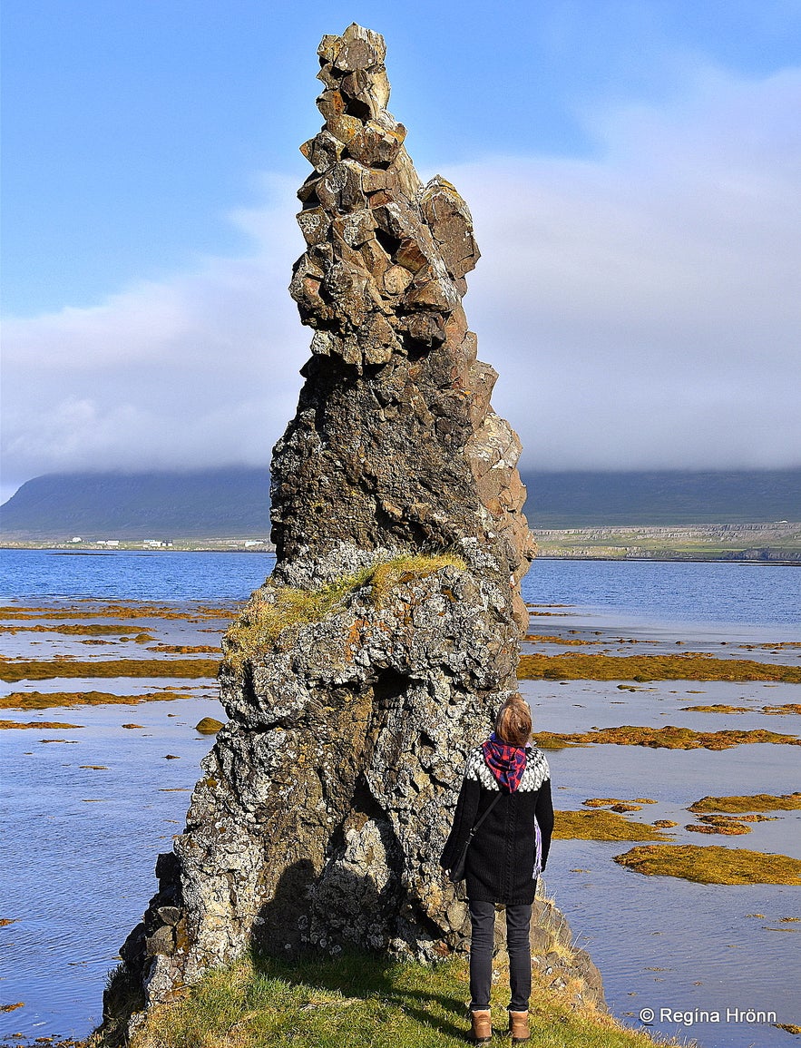 Regína in front of trolls in Iceland