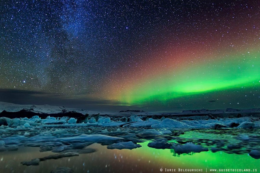 A beautiful shot of the Northern Lights dancing above the Jökulsárlón glacier lagoon on the island's South Coast.