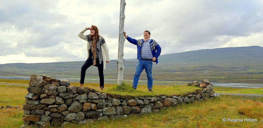 Regína by the Viking ship by The beautiful Geirsstaðakirkja Turf Church in East-Iceland - a Replica of an old Turf Church​