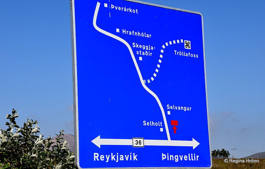 Road sign leading to Tröllafoss waterfall