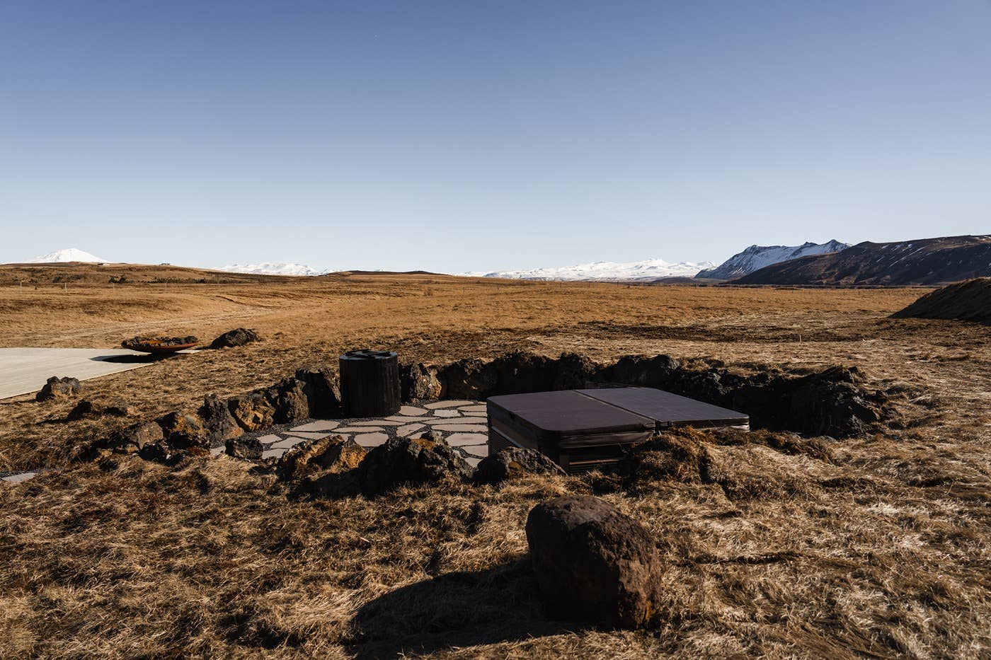 An outdoor sauna and tub awaits guests at Hof Luxury Villa in South Iceland.