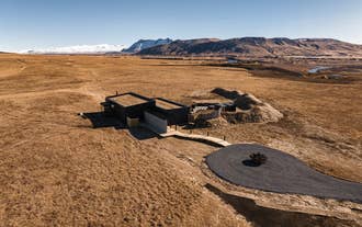 A view of the Hof Luxury Villa property surrounded by mountains and glacier views.