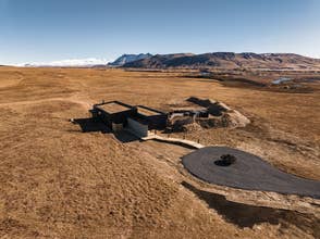 A view of the Hof Luxury Villa property surrounded by mountains and glacier views.