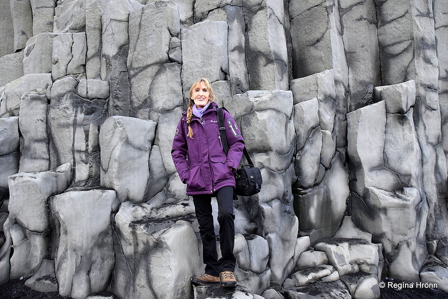 Regína by the basalt columns at Reynisfjara beach